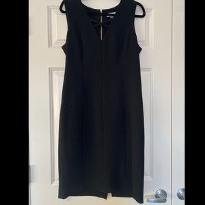 Black bodycon Calvin Klein dress with gold zipper; Size 12.